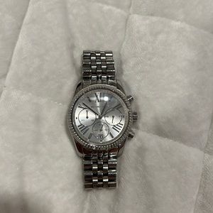 Women’s silver Michael Kors watch